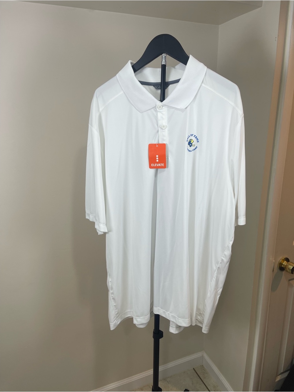 Elevate Men's White Polo with Subtle Embroidered Crest